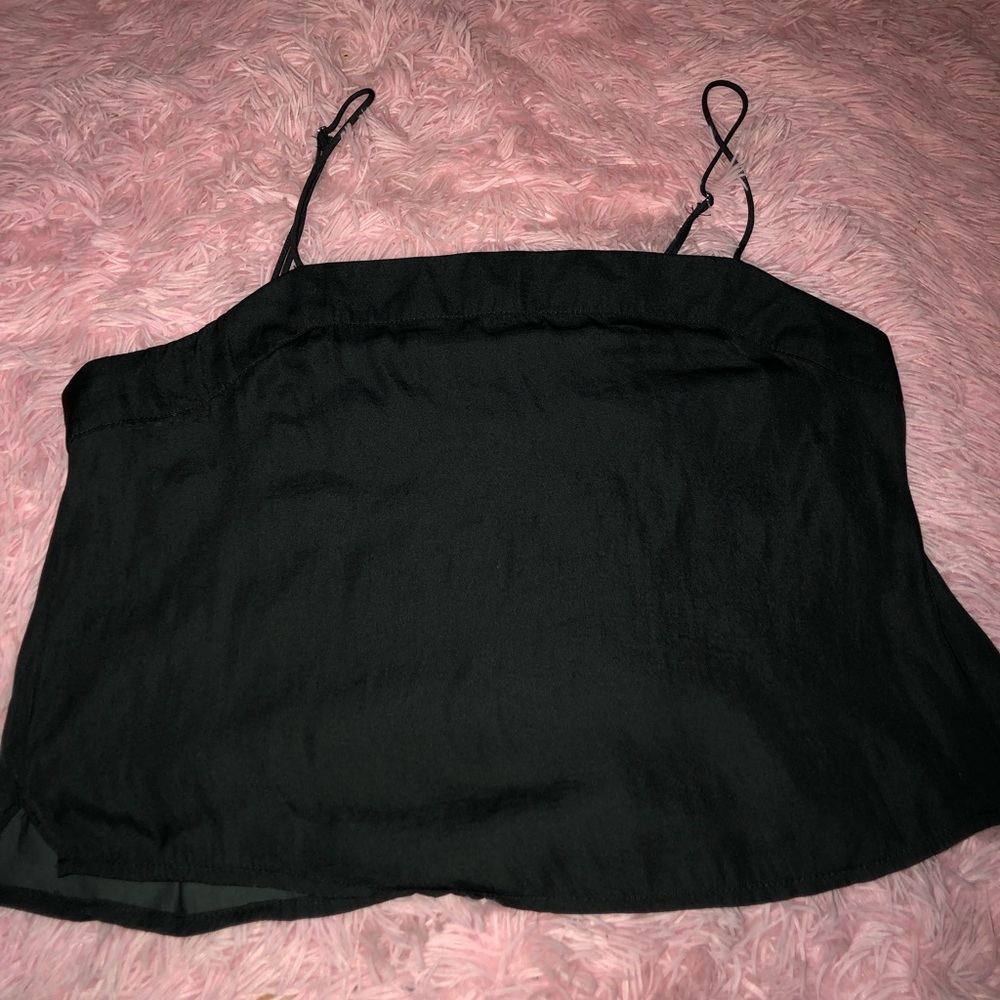 Great condition. Worn once. Black top. Size med